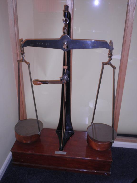 Appraisal: A set of lb brass and iron beam scales for