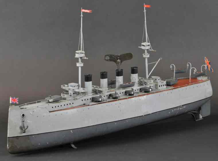 Appraisal: BING ARMORED CRUISER Germany c - clockwork powered four funnel