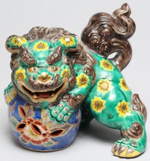 Appraisal: Chinese Glazed Enamel Shi Lion The earthenware foo dog in