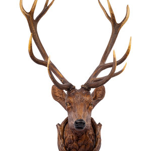 Appraisal: A Black Forest Carved Stag Head th Century Height inches