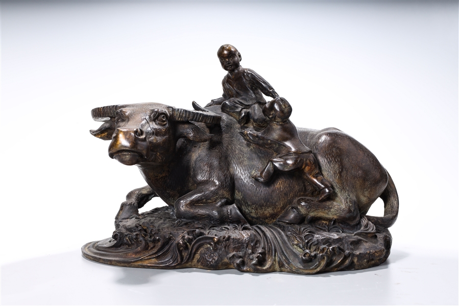 Appraisal: Chinese bronze water buffalo with children climbing onto it's back