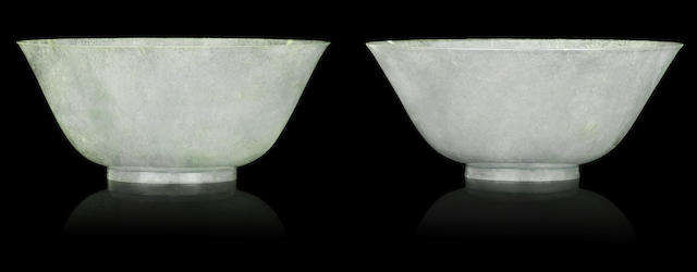 Appraisal: A pair of jadeite bowls th centuryEach finely formed of