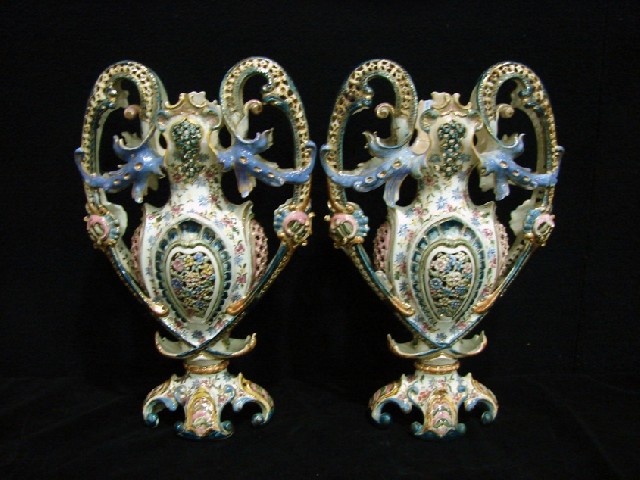 Appraisal: A large pair of Zolnay Fischer polychrome reticulated vases with