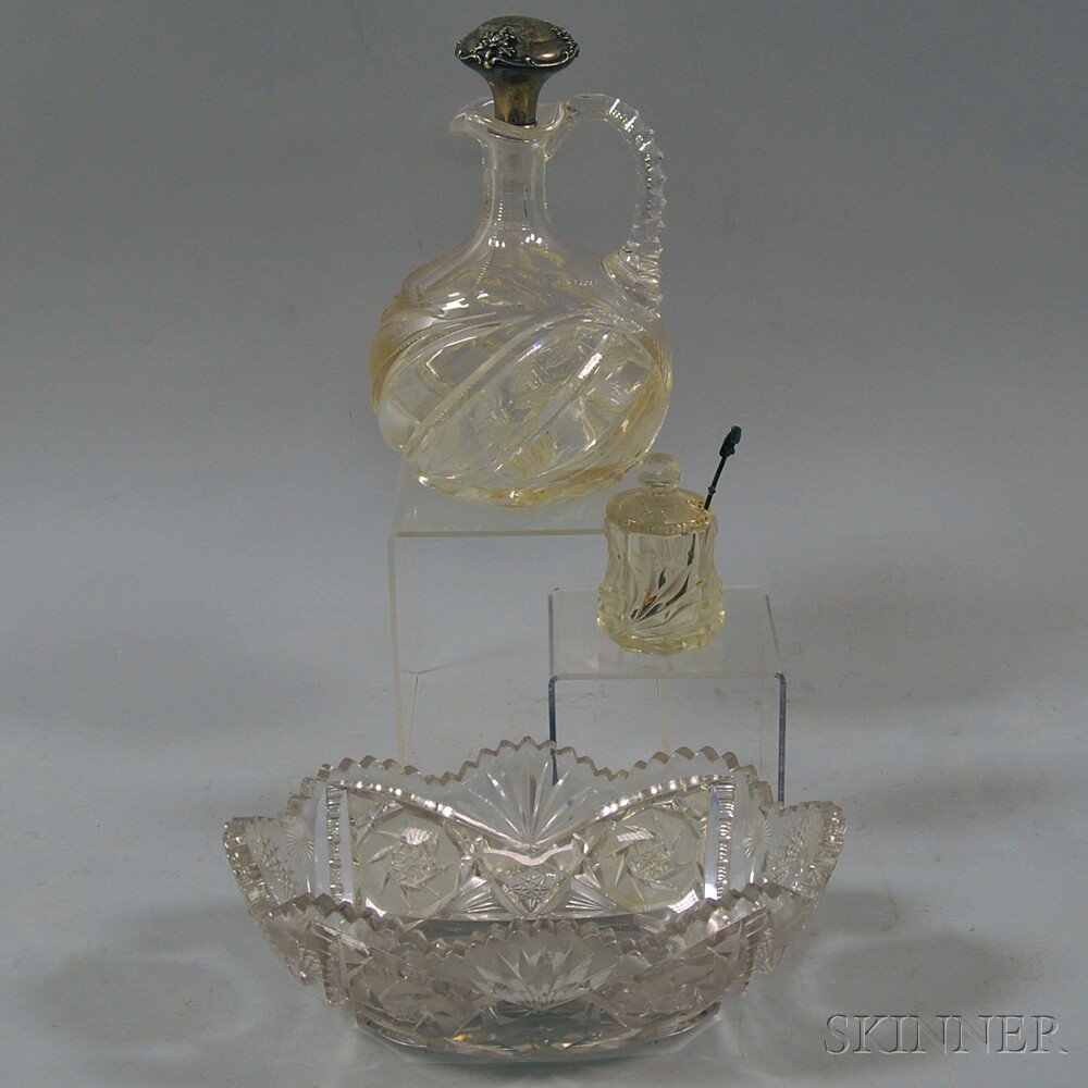 Appraisal: Three Cut-glass Items a ewer with sterling-mounted stopper a bowl