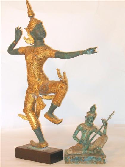 Appraisal: Two Thai gilt and patinated metal figures th century Comprising