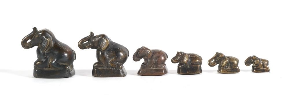 Appraisal: Six figural trunk up elephant opium scale weights Probably Thai