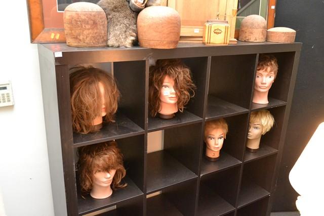 Appraisal: FOUR VINTAGE HAT BLOCKS AND A GROUP OF MANNEQUIN HEADS