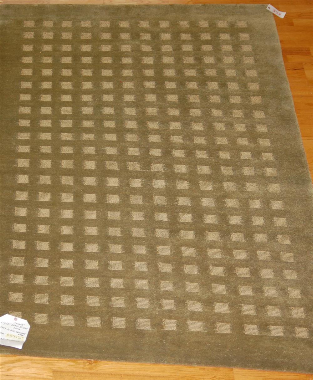 Appraisal: CONTEMPORARY WOOL RUG consisting of a tone-on-tone moss green textured