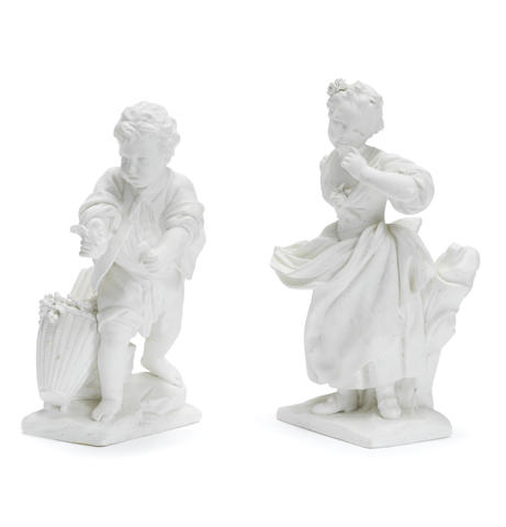 Appraisal: A pair of S vres biscuit figures of 'Le Porteur