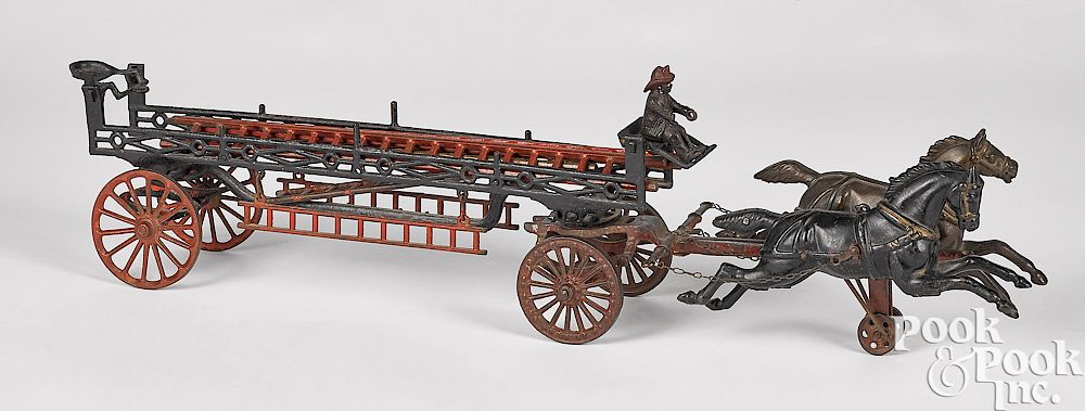 Appraisal: Ives cast iron horse drawn fire ladder wagon Ives cast