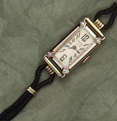 Appraisal: ART DECO RAYMOND YARD WATCH Yellow gold lady's watch with