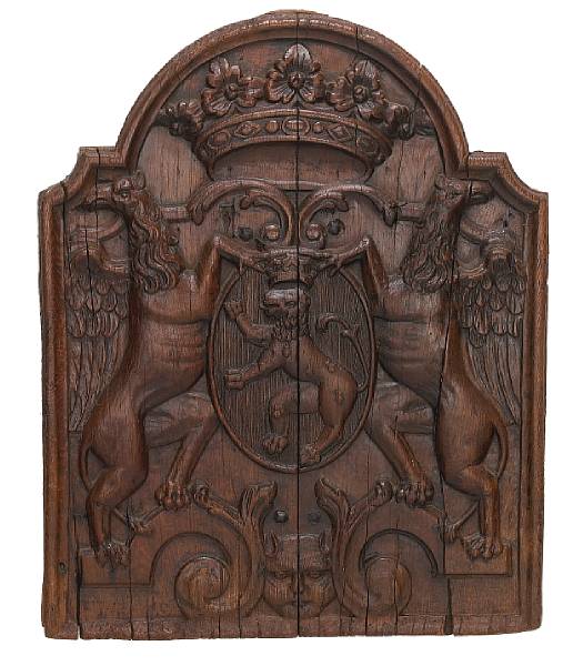 Appraisal: An English Baroque carved oak armorial panel late th early