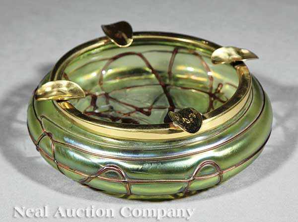 Appraisal: A Loetz Iridescent Art Glass Dish with brass ashtray rim