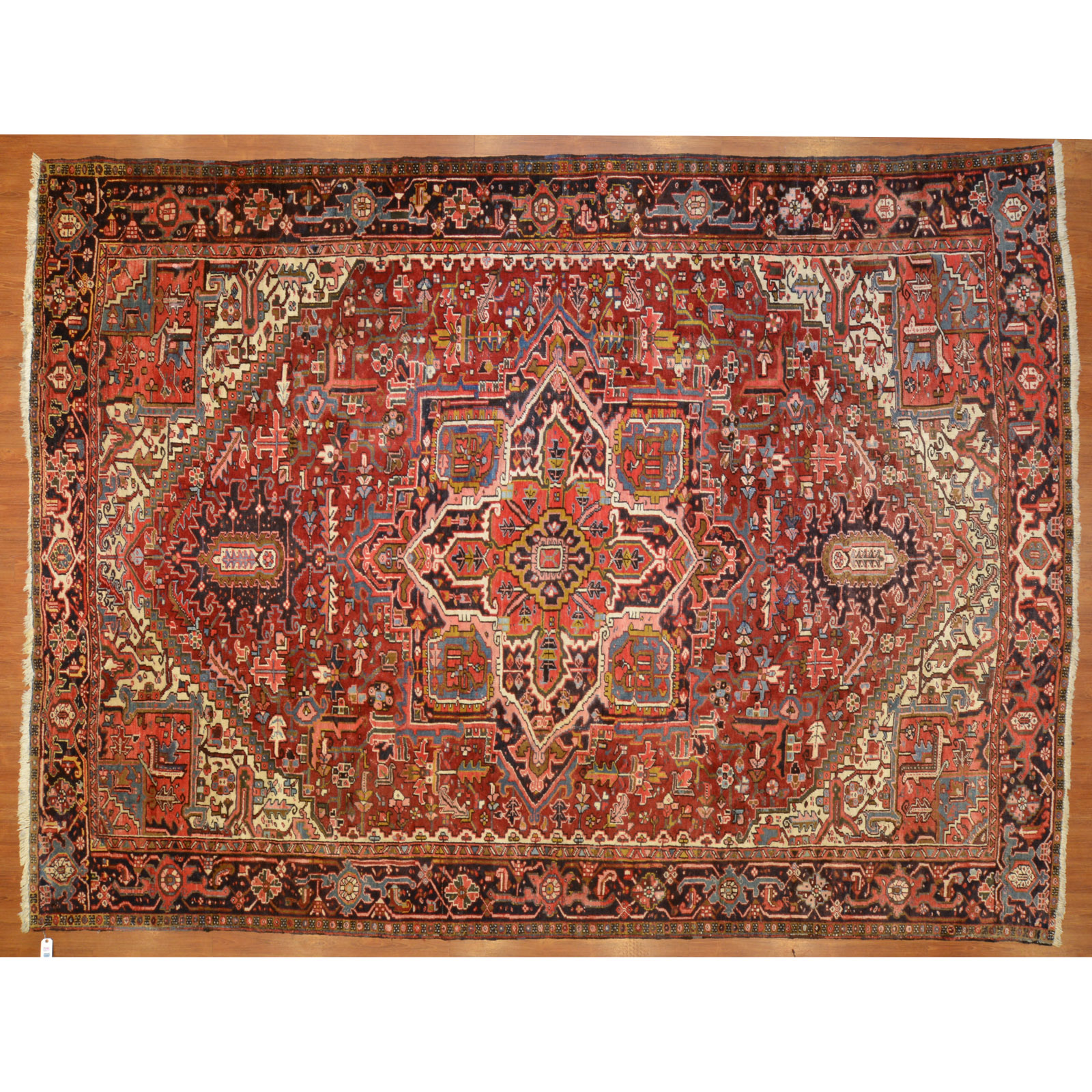 Appraisal: HERIZ RUG PERSIA X Second half- th century hand-knotted wool