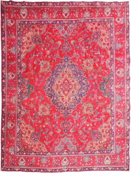 Appraisal: A late Tabriz carpet the crimson field with a cusped