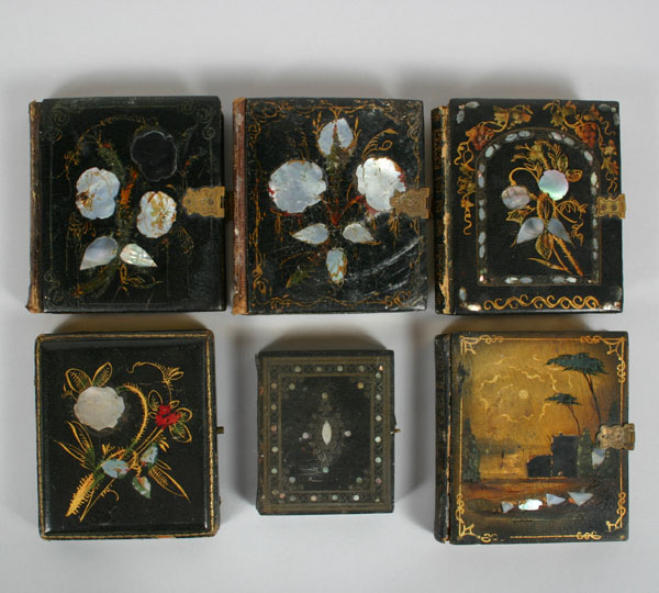 Appraisal: Ambrotype and tintypes in leather cases five varying images one