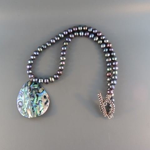 Appraisal: Pearl Necklace peacock black pearls abalone pendant sterling clasp