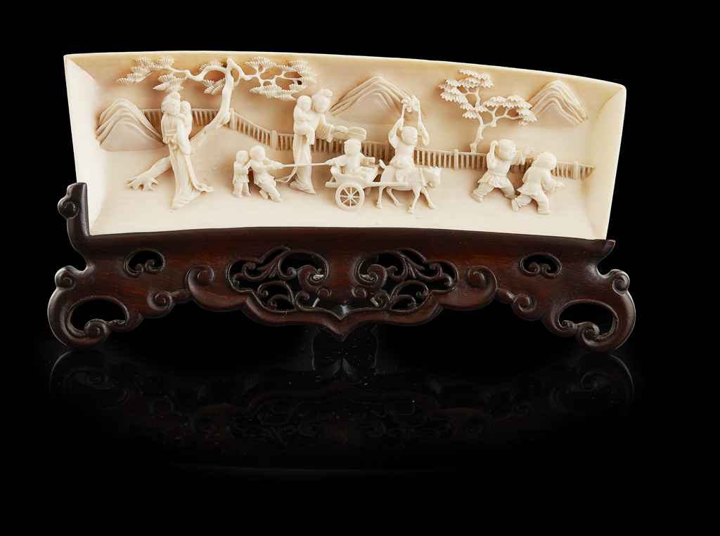 Appraisal: YFINELY CARVED IVORY WRIST REST LATE QING DYNASTY REPUBLIC PERIOD