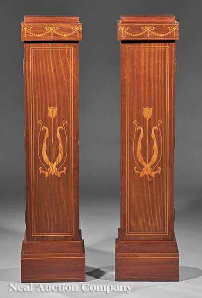 Appraisal: A Pair of Edwardian Inlaid Mahogany Pedestals c square plinths