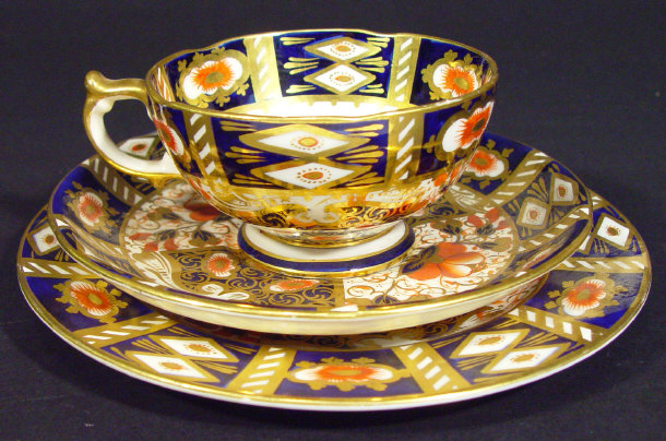 Appraisal: Victorian Davenport trio hand painted and gilded in the Imari