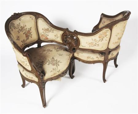 Appraisal: A Louis XVI conversation seat the moulded arched back over