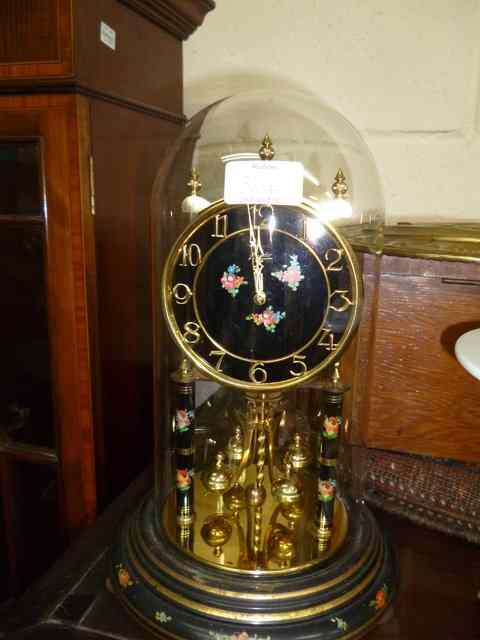 Appraisal: AN ENFIELD OAK CASED WALL CLOCK the silvered dial with