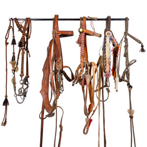 Appraisal: A Group of Western Horse Bridles and Quirts late th