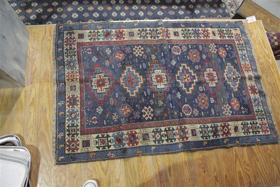 Appraisal: ORIENTAL RUG Midnight blue ground with triple border and repeating