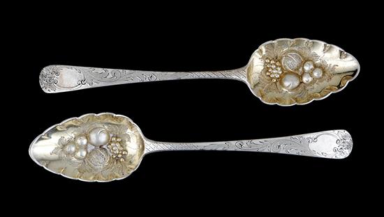 Appraisal: Pair Georgian berry sterling spoons London dated each chased with