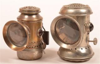 Appraisal: Two Nickeled Brass Bicycle Lanterns Colorless bull's-eye lenses with red