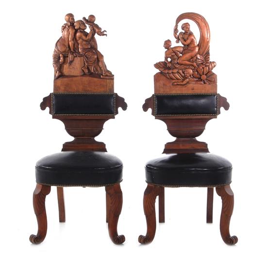 Appraisal: Pair Continental pictorial carved cherry hall chairs late th early