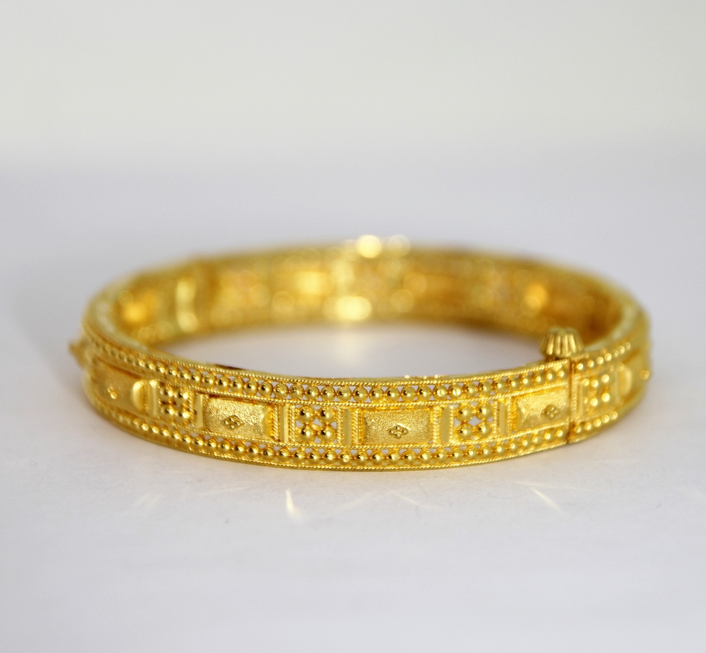 Appraisal: K GOLD INDIAN MUGHAL STYLE BANGLE BRACELET India th CenturyRaised