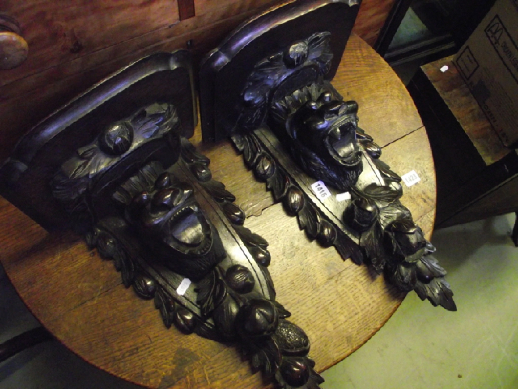 Appraisal: A pair of Victorian carved oak wall brackets in the