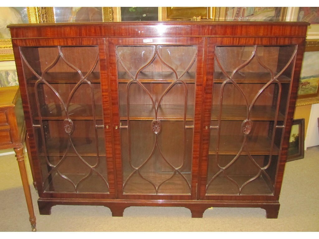 Appraisal: Mahogany three door bookcase