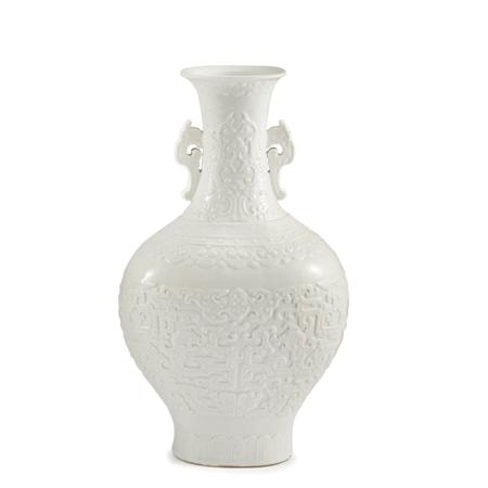 Appraisal: Chinese Molded White Glazed Porcelain Vase Estimate -