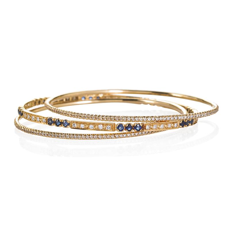 Appraisal: THREE DELICATE ROUND GOLD DIAMOND BANGLES Condition Report