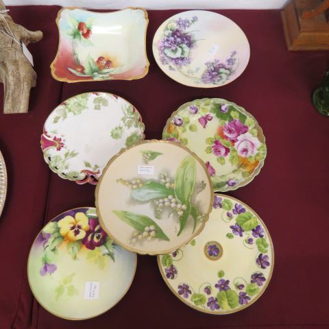 Appraisal: Fine Porcelain Plates and a Serving Bowl most have handpainted