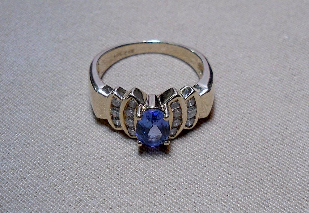 Appraisal: Tanzanite and Diamond Ring K marked contemporary yellow gold setting