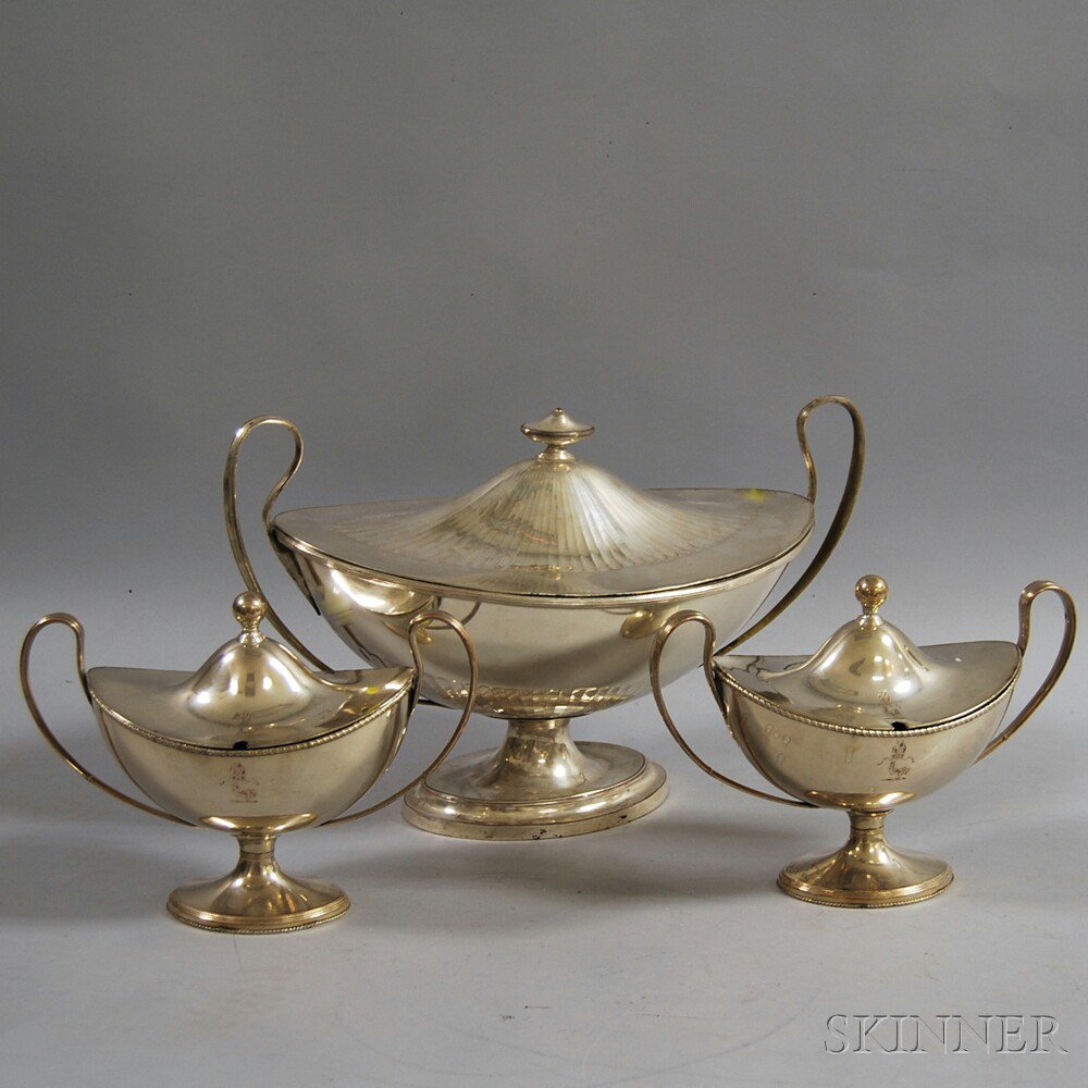 Appraisal: Three Neoclassical-style Silver-plated Covered Urn-form Serving Dishes two smaller urns