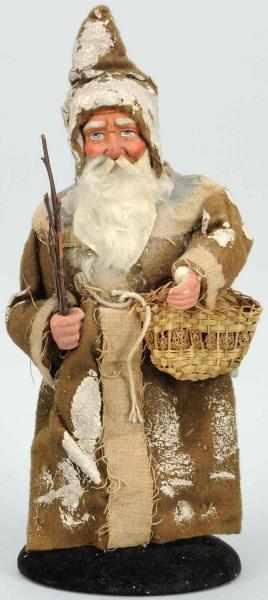 Appraisal: Santa Belsnickle Holding Basket Composition face with rabbit fur beard