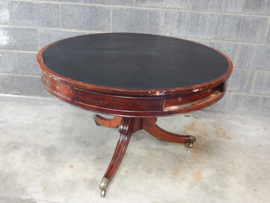 Appraisal: A George III style mahogany drum table the circular rotating