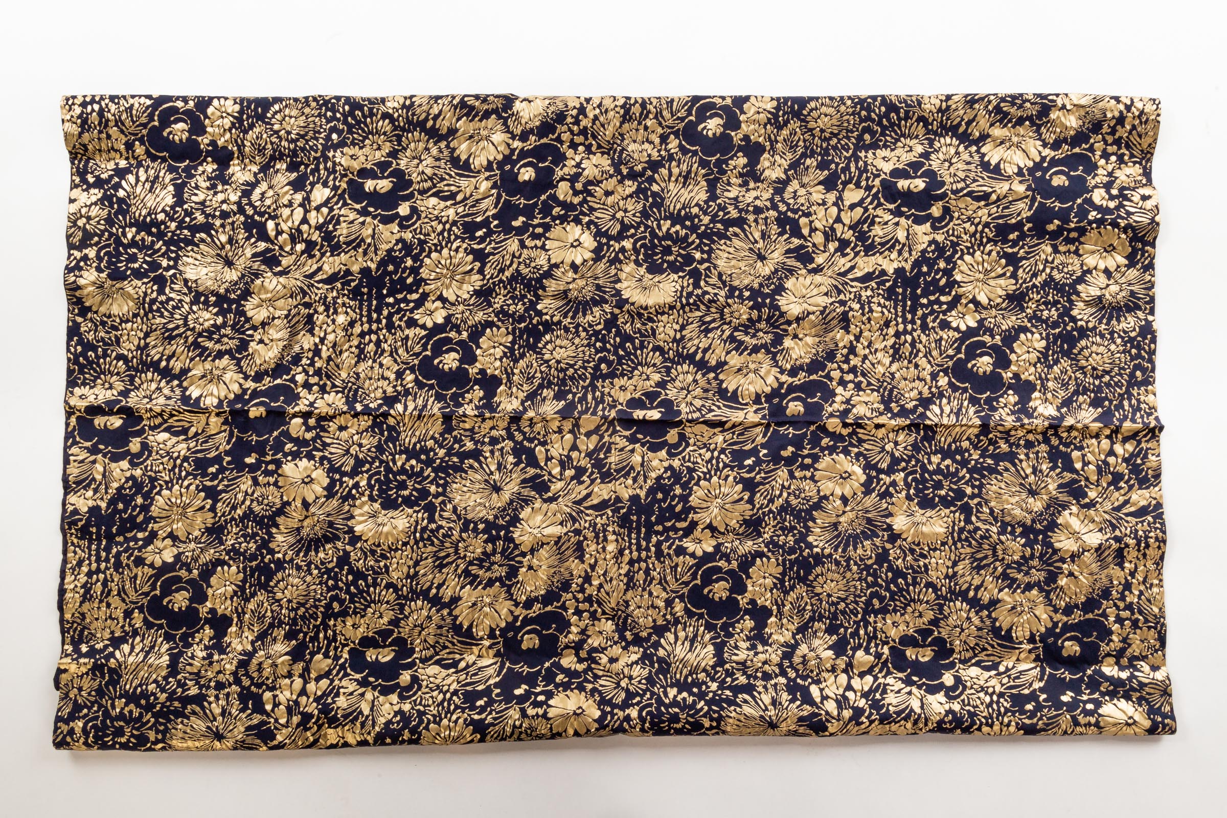 Appraisal: NAVY AND GOLD FABRIC Floral pattern in metallic gold