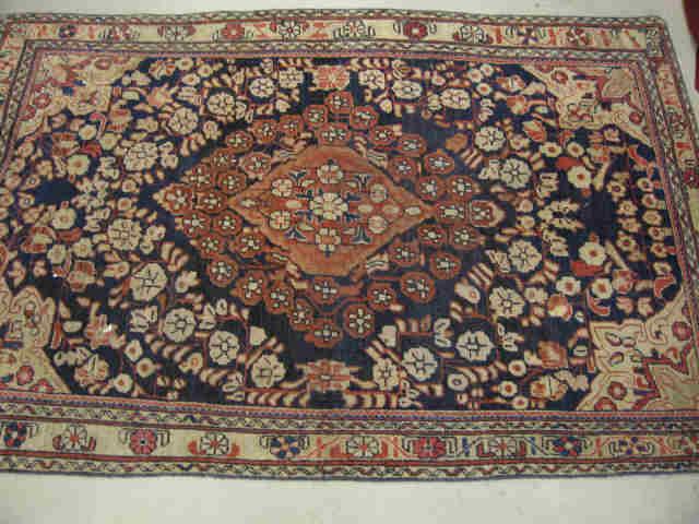 Appraisal: Persian Mahal Persian Handmade Rug fancy floral on blue field