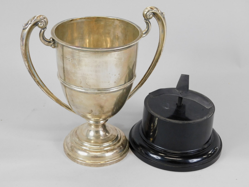 Appraisal: A silver two handled trophy cup on domed foot London