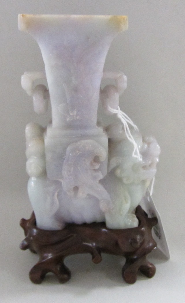 Appraisal: A lavender jade carving of a Buddhist lion th century