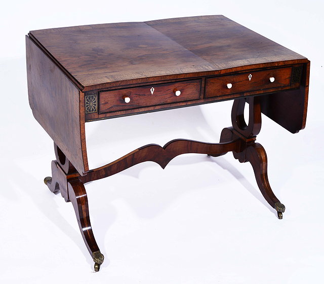 Appraisal: A GEORGE III ROSEWOOD SOFA TABLE with cross banded top