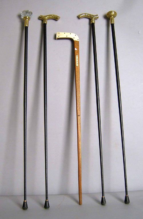 Appraisal: Five canes to include with brass hand holds