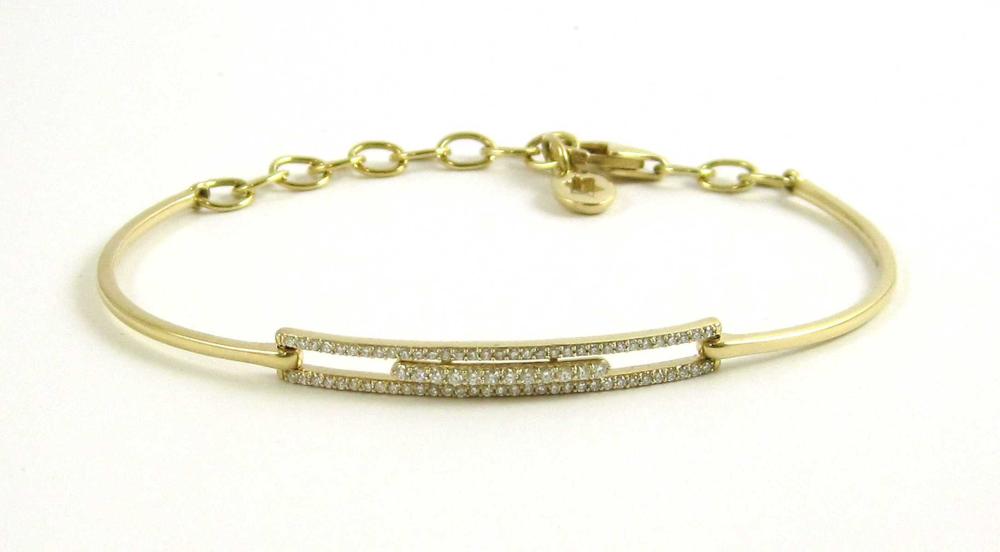 Appraisal: DIAMOND AND FOURTEEN KARAT GOLD BRACELET set with round-cut diamonds