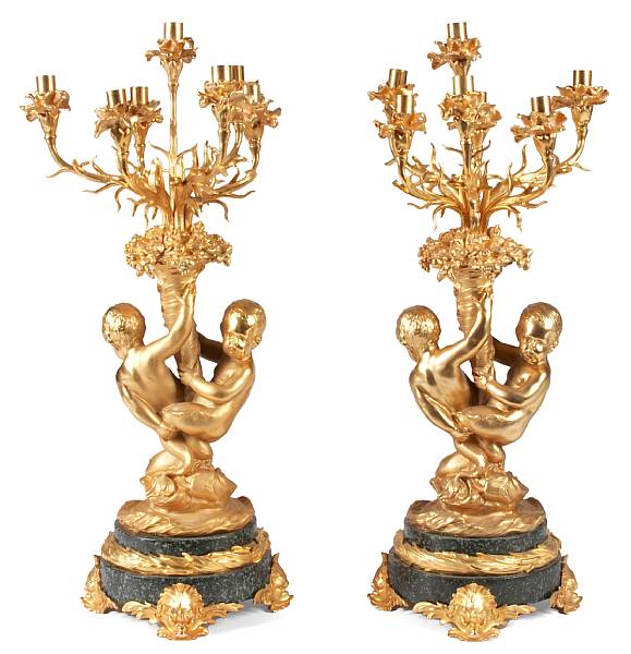 Appraisal: A pair of Empire style marble and gilt bronze seven