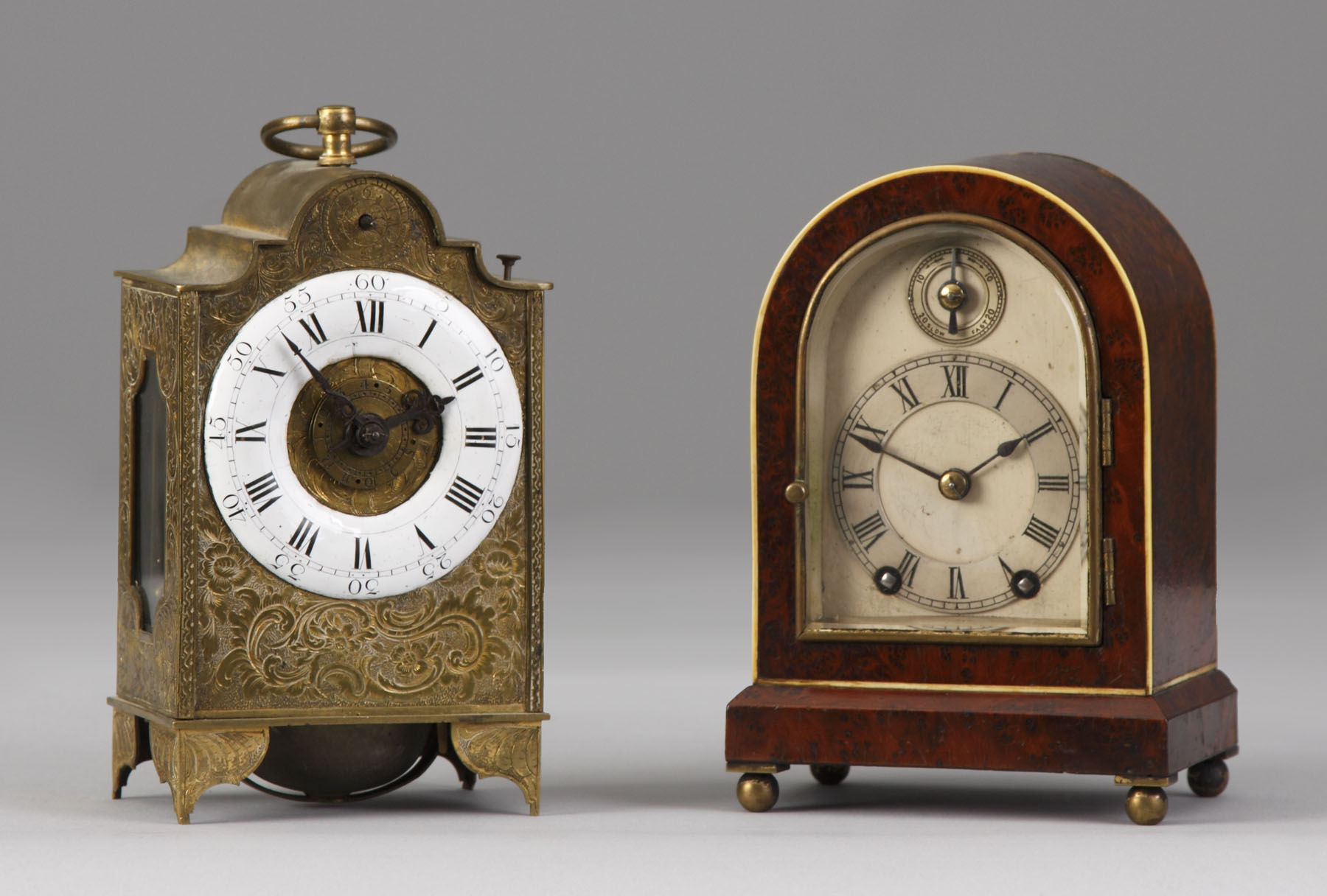 Appraisal: continental Miniature Brass Bracket Clock Embossed brass case Painted porcelain